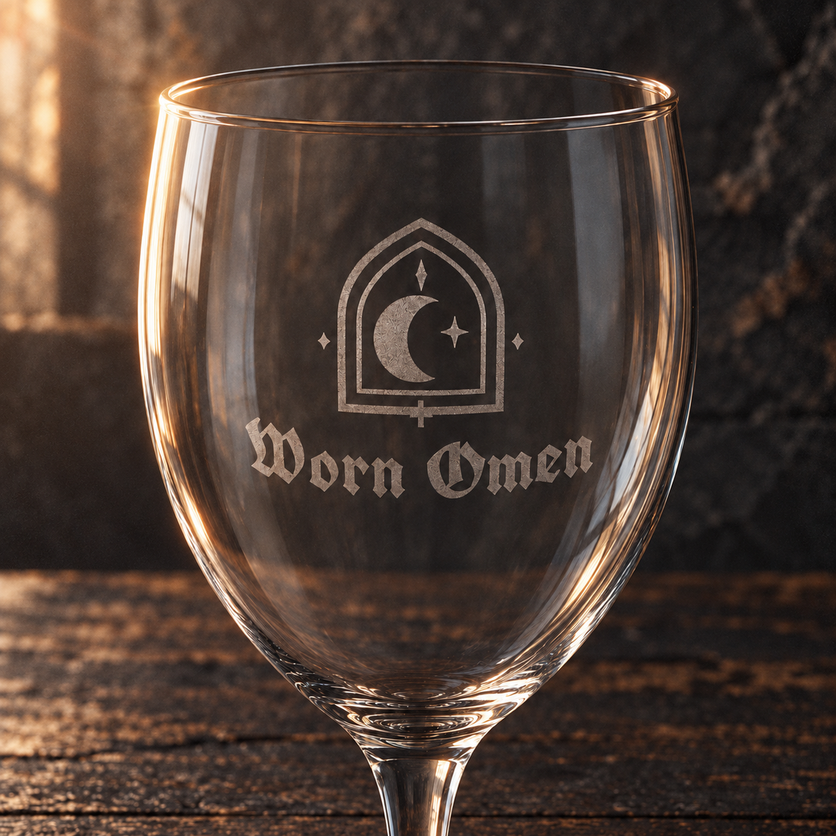 Detail of the frosted crescent, gothic arch and Worn Omen engraving on VESPER.