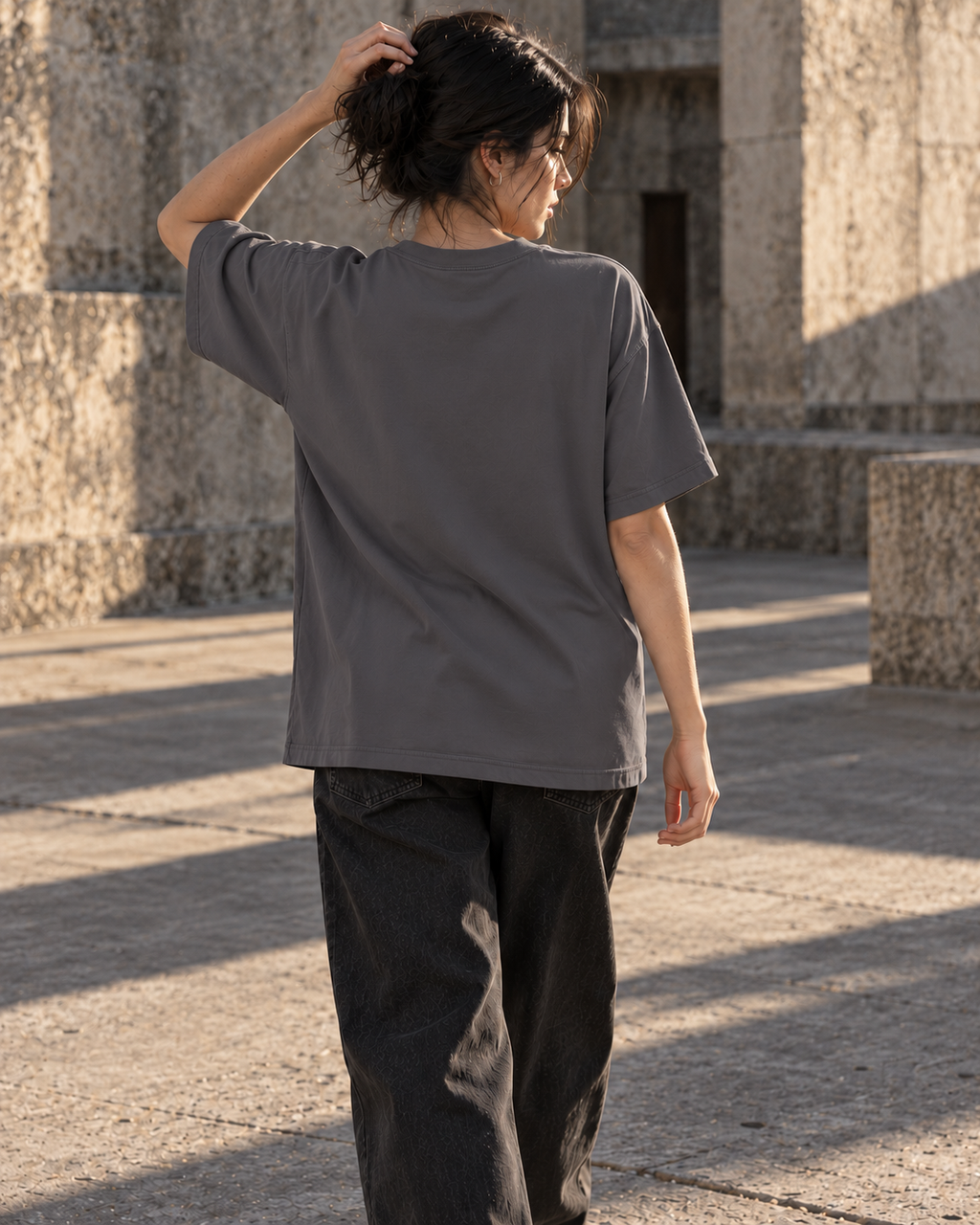 Back view of the Dead Air tee, showing plain solid Magnet-grey cotton